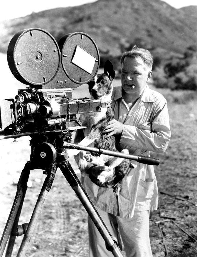 W.C. Fields 1934 Behind the camera with his dog on the set of Old Fashioned Way at Paramount Ranch.jpg